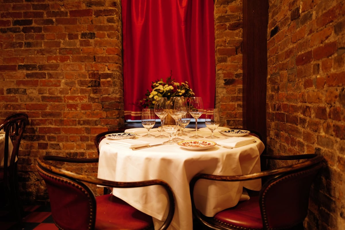 Elegant dining room and bar with warm ambient lighting at CENTRICO, Wan Chai