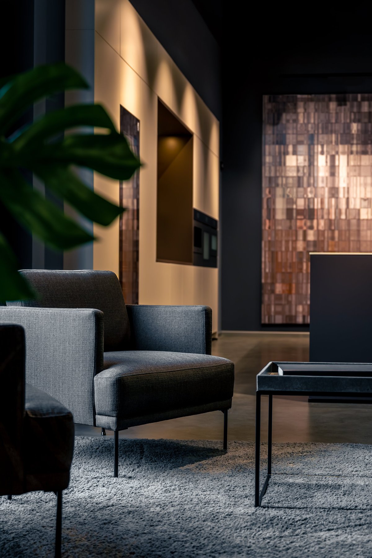 Elegant upholstered armchair seating in a minimalist lounge interior